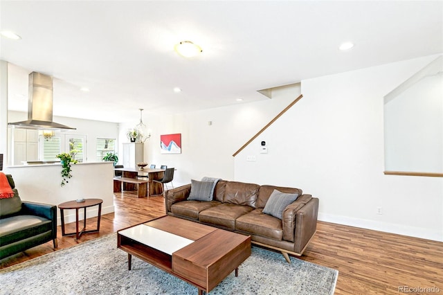 4530 Quitman St, Denver, CO 80212 - living area featuring recessed lighting, wood finished floors, and baseboards