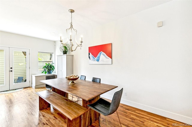 4530 Quitman St, Denver, CO 80212 - dining area with light wood-style floors, baseboards, a notable chandelier, and french doors