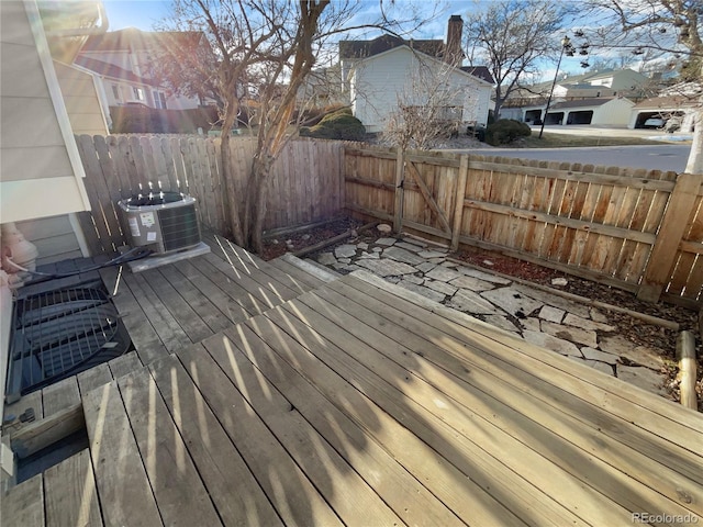 deck featuring fence and central AC