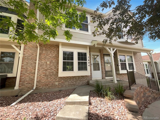 7604 S Steele St, Centennial, CO 80122 - view of property with brick siding