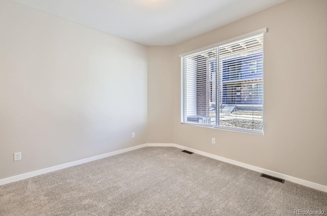 empty room with carpet floors