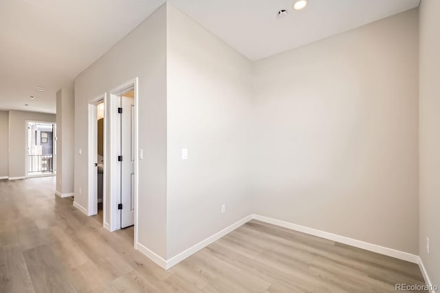 hall with light hardwood / wood-style flooring