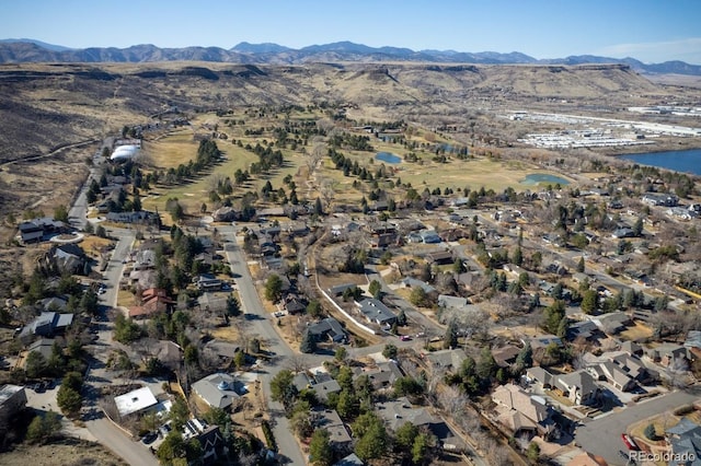 aerial view with a residential view and a water and mountain view