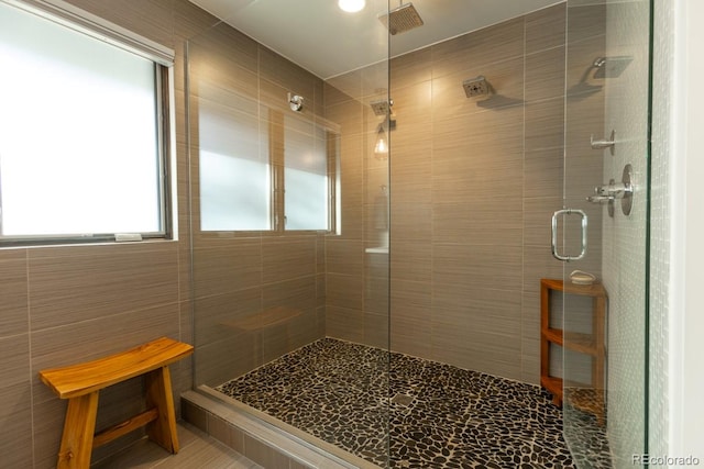 full bathroom with a shower stall