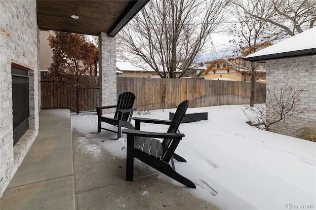 view of snow covered patio