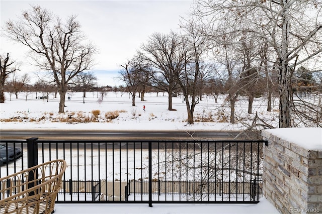 view of snow covered deck