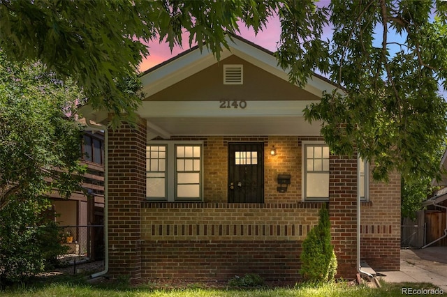 2140 S Washington St, Denver, CO 80210 - view of front of property featuring brick siding