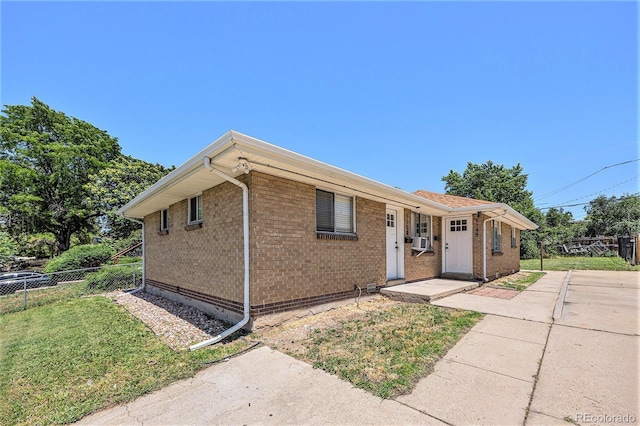 1148 Rosemary St, Denver, CO 80220 - ranch-style home featuring brick siding