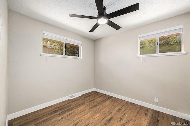 1148 Rosemary St, Denver, CO 80220 - unfurnished room with dark wood finished floors and ceiling fan