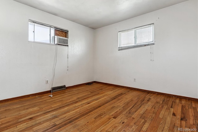 4940-42 W 9th Ave W, Denver, CO 80204 - spare room with light wood-style flooring and cooling unit