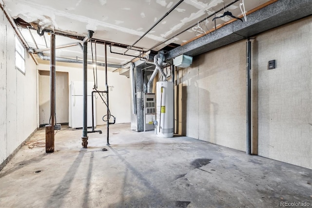 4940-42 W 9th Ave W, Denver, CO 80204 - unfinished basement featuring water heater, heating unit, and freestanding refrigerator