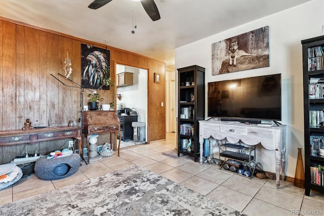 4940-42 W 9th Ave W, Denver, CO 80204 - living area with ceiling fan, tile patterned floors, and wood walls