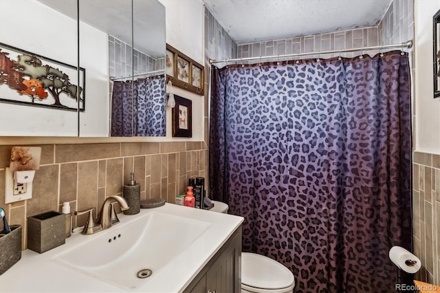 4940-42 W 9th Ave W, Denver, CO 80204 - full bath with vanity, tile walls, a shower with shower curtain, and tasteful backsplash