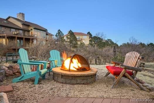 exterior space with an outdoor fire pit