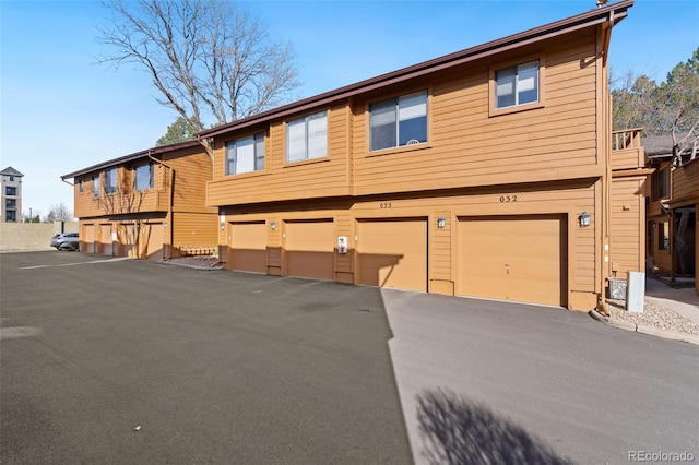 view of property featuring an attached garage