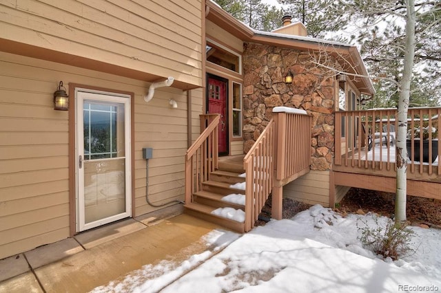 view of snow covered deck