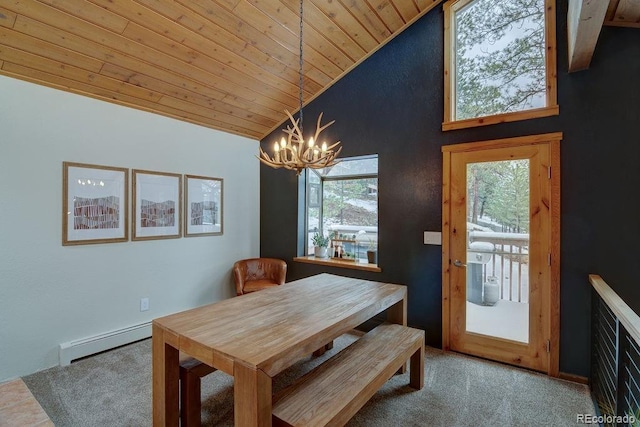 dining area featuring vaulted ceiling, baseboard heating, wood ceiling, carpet, and a chandelier