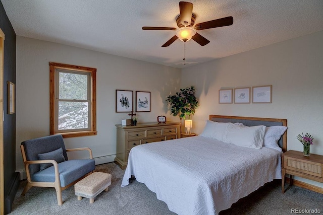 carpeted bedroom featuring a baseboard radiator, a ceiling fan, and a textured ceiling