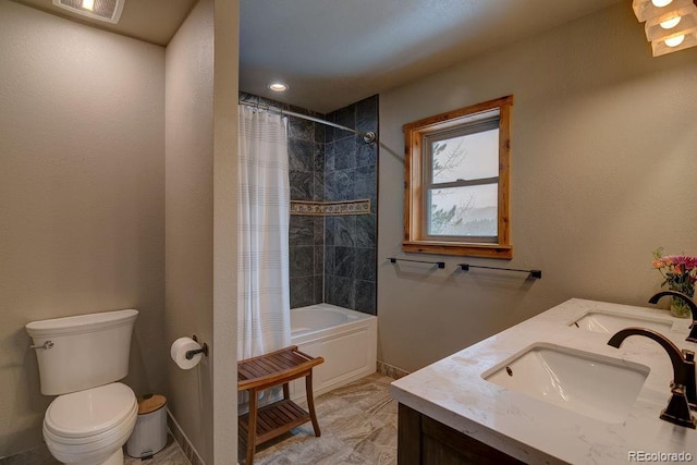bathroom with shower / bathtub combination with curtain, toilet, double vanity, and baseboards