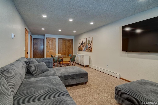 living room featuring a baseboard heating unit, recessed lighting, carpet flooring, baseboards, and a textured ceiling