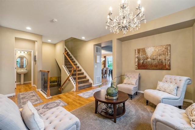 10705 Pinewalk Way, Highlands Ranch, CO 80130 - living area with a chandelier, stairs, recessed lighting, wood finished floors, and baseboards