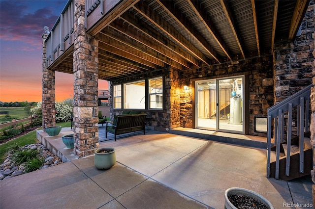 10705 Pinewalk Way, Highlands Ranch, CO 80130 - patio terrace at dusk featuring a patio