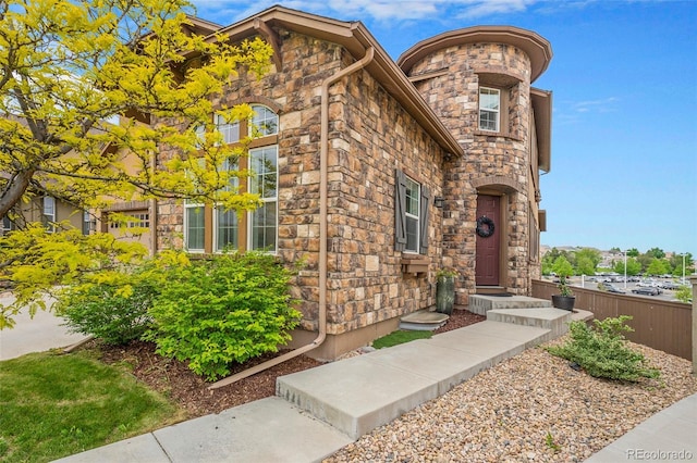 10705 Pinewalk Way, Highlands Ranch, CO 80130 - view of front of property featuring stone siding