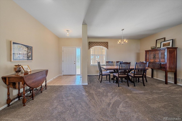 23425 E Otero Dr, Aurora, CO 80016 - carpeted dining area featuring a chandelier and baseboards