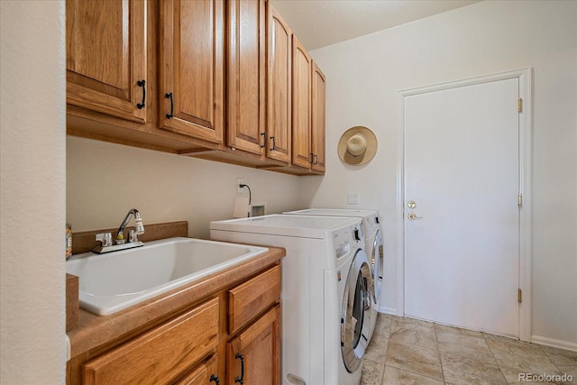 23425 E Otero Dr, Aurora, CO 80016 - laundry area with independent washer and dryer and cabinet space