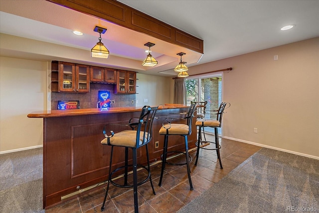 23425 E Otero Dr, Aurora, CO 80016 - indoor dry bar featuring decorative light fixtures, recessed lighting, and dark tile patterned flooring