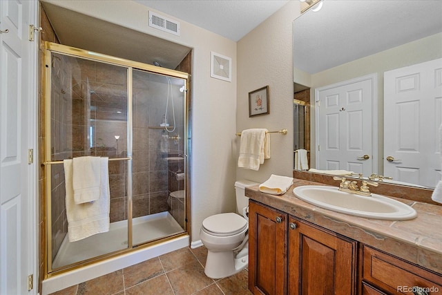 23425 E Otero Dr, Aurora, CO 80016 - full bath featuring vanity, a stall shower, and tile patterned flooring