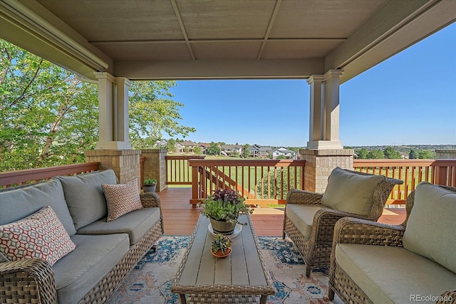 23425 E Otero Dr, Aurora, CO 80016 - wooden terrace with an outdoor living space