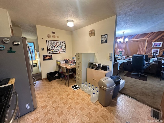 33691 Nova Rd, Pine, CO 80470 - office with a chandelier, a textured ceiling, tile patterned floors, and wooden walls