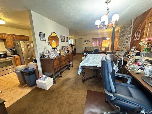 33691 Nova Rd, Pine, CO 80470 - carpeted dining space with a textured ceiling, a chandelier, and a desk