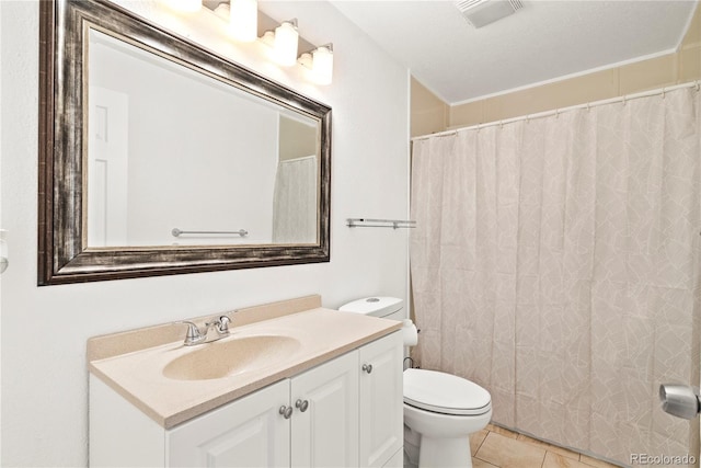 bathroom featuring vanity, walk in shower, a textured ceiling, toilet, and tile patterned floors