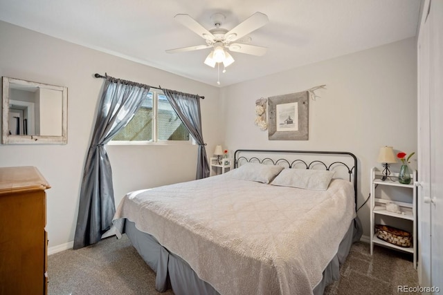 933 Straight Creek Dr Unit 101, Dillon, CO 80435 - bedroom featuring dark colored carpet, baseboards, and a ceiling fan