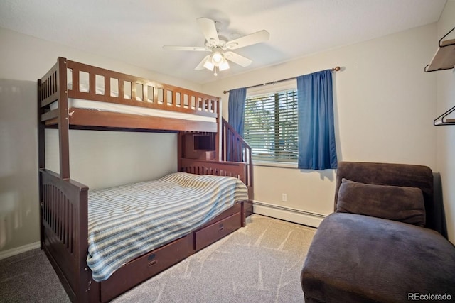 933 Straight Creek Dr Unit 101, Dillon, CO 80435 - bedroom featuring baseboards, a baseboard radiator, ceiling fan, and carpet floors