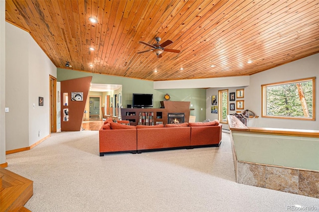 living room featuring ceiling fan, wooden ceiling, and light carpet