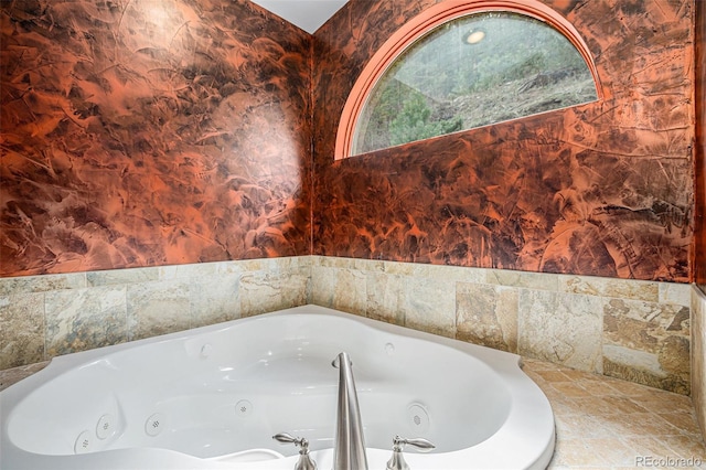 bathroom with tiled bath