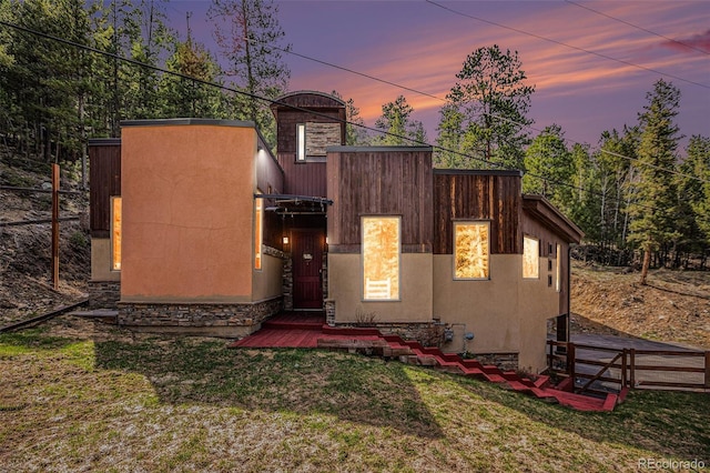 view of front of house with a lawn