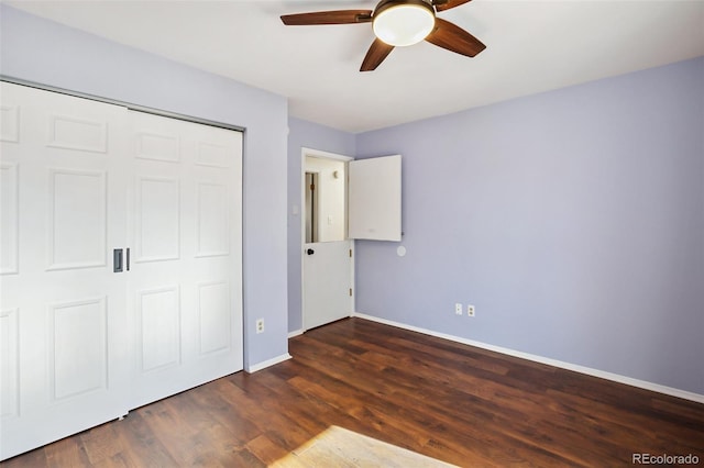 unfurnished bedroom featuring a closet, dark wood-type flooring, and ceiling fan