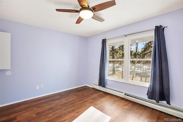 empty room with wood-type flooring, baseboard heating, and ceiling fan