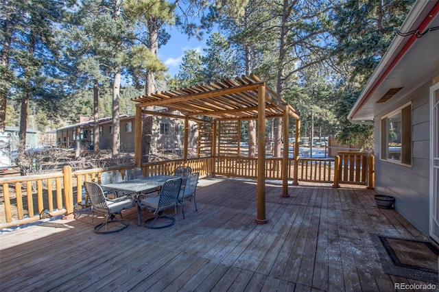 wooden deck with a pergola