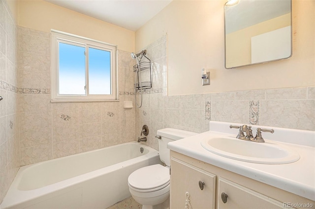 3065 Zion St, Aurora, CO 80011 - full bath featuring toilet, tile walls, bathtub / shower combination, and vanity
