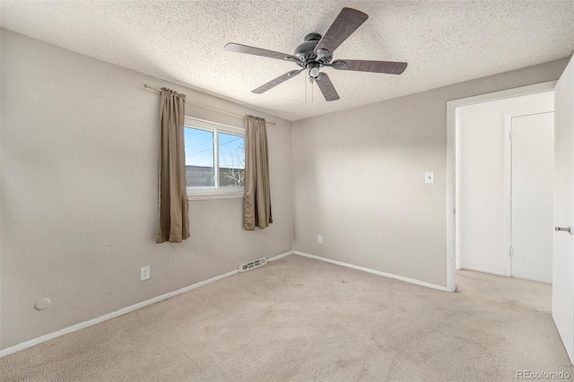 3065 Zion St, Aurora, CO 80011 - carpeted empty room with a textured ceiling, a ceiling fan, and baseboards