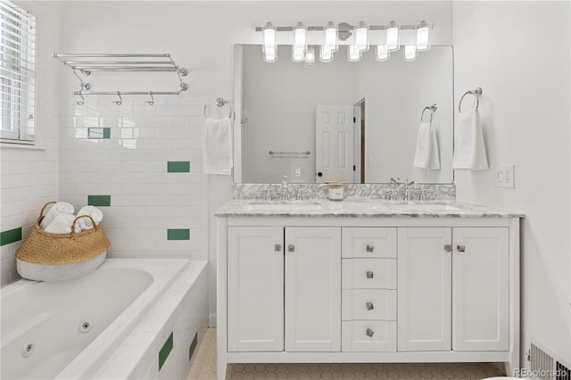 bathroom featuring a sink, visible vents, and double vanity