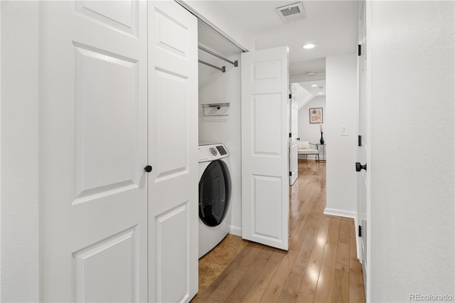 laundry room featuring light wood finished floors, visible vents, laundry area, recessed lighting, and washer / clothes dryer