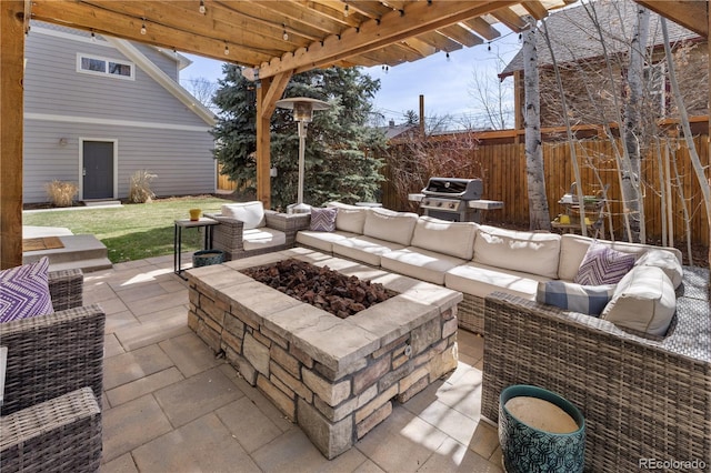 view of patio / terrace with area for grilling, an outdoor living space, a pergola, and fence