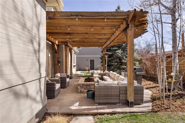 view of patio featuring an outdoor hangout area and a pergola