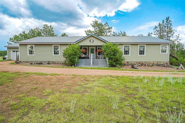 ranch-style house featuring a porch